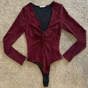 Francesca’s Sparkly Maroon Deep-V Body Suit